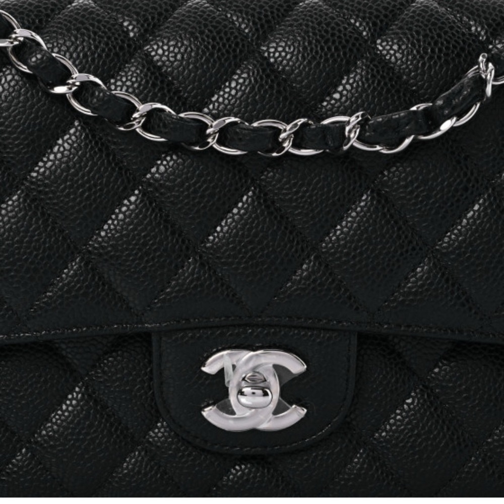 CHANEL Black Quilted Shoulder Bag with Silver Chain